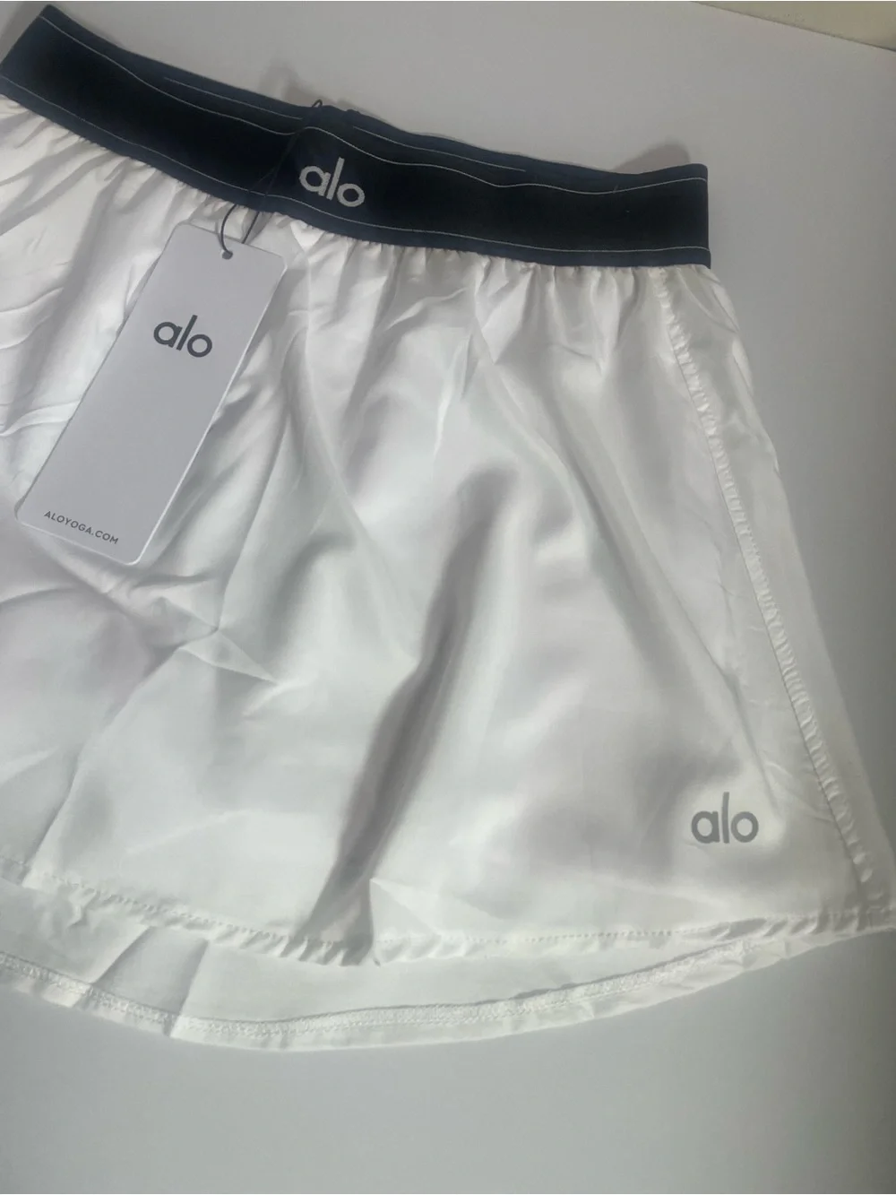ALO Yoga White Skirt with Black Elastic Waistband